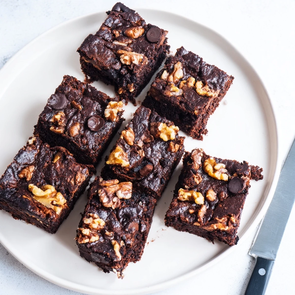 Rich, fudgy zero-waste brownies using nut-milk pulp for guilt-free indulgence.  