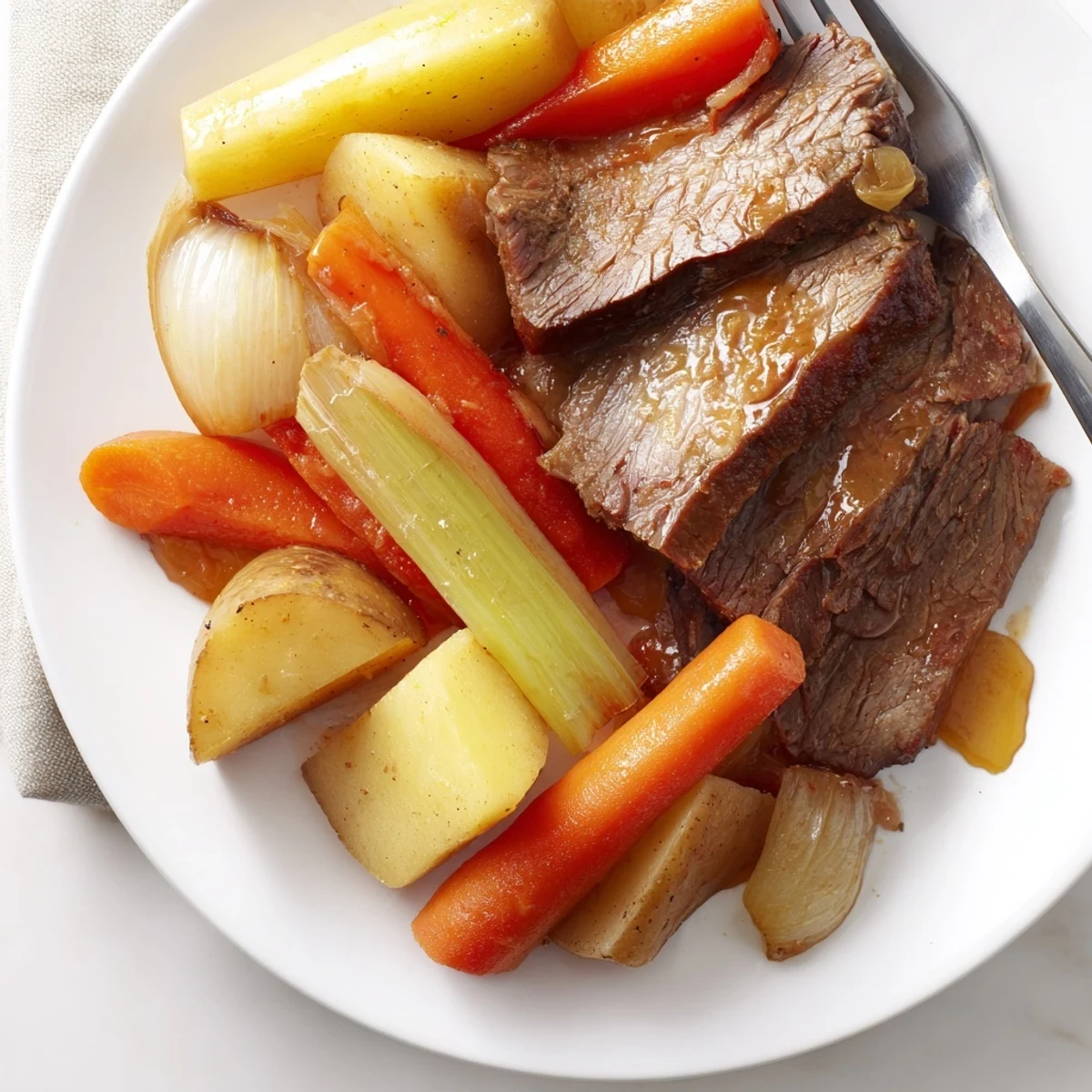 A mouthwatering Sunday Pot Roast with roasted veggies garnished, perfect for family meals.  