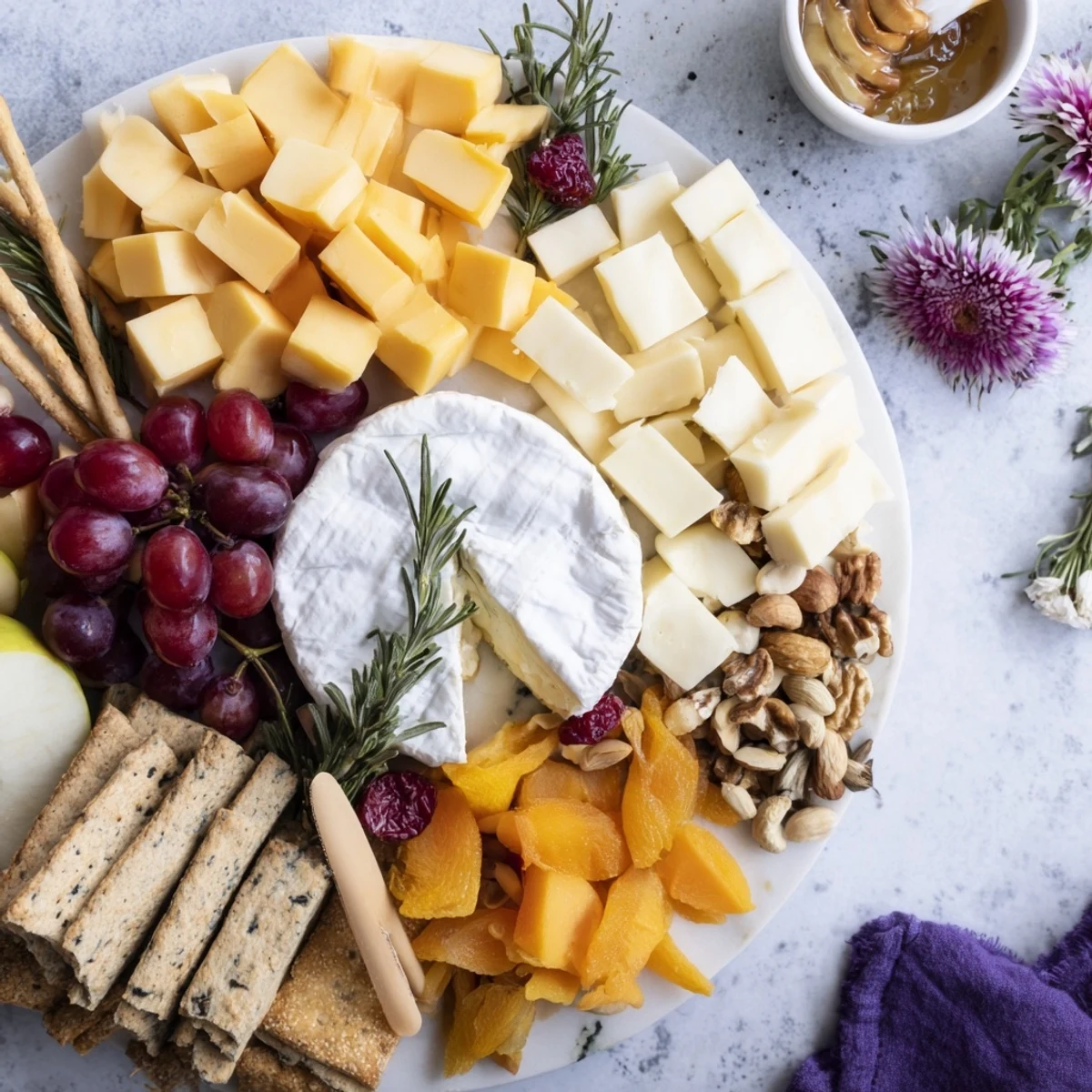 Beautiful Woodland Creature Cheese Platter with honey drizzle, inviting you to enjoy this delicious appetizer.