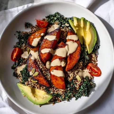 Vibrant Quinoa, Kale & Roasted Beet Bowl: colorful beets, fluffy quinoa, and creamy tahini dressing, delicious.