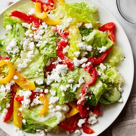 Crisp Bella Hadid Salad, a colorful mix of greens, feta, and a bright lemon dressing.