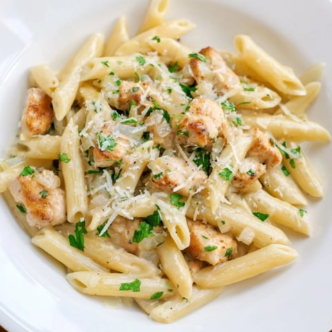 Quick Garlic Parmesan Chicken Pasta: A creamy, one-pan meal with golden chicken and al dente pasta.