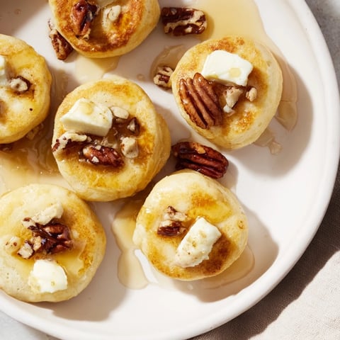 Golden, baked Pancake Brie Bites: warm and melty brie encased in fluffy pancake batter, delicious.