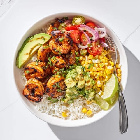 Colorful Easy Grilled Shrimp Bowl featuring fresh ingredients and a zesty lime twist.  