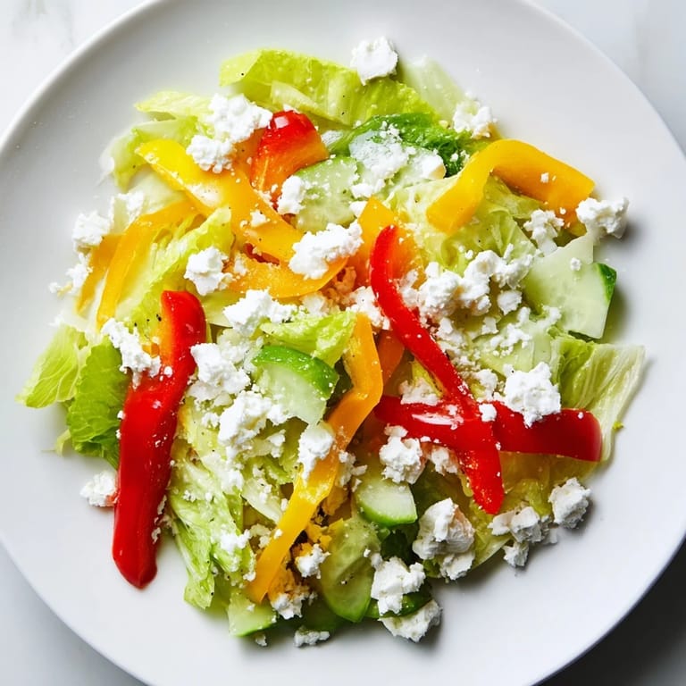 Enjoy a refreshing Bella Hadid Salad, showcasing crunchy veggies and creamy feta cheese, ready in minutes.